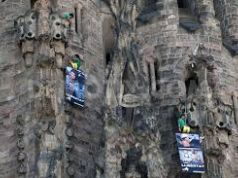 Greenpeace activists scale the Sagrada Familia in protest